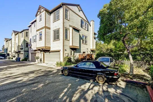 a view of street with parked cars