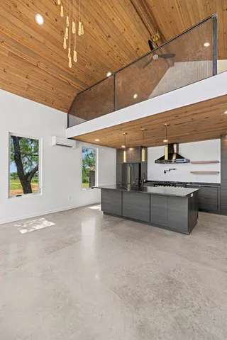 a bathroom with double sink and a mirror