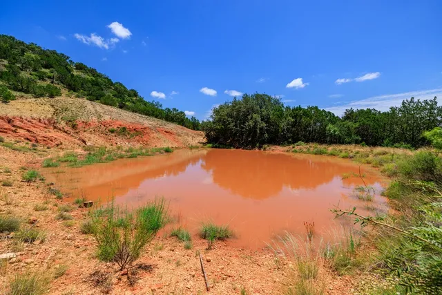 a view of a hallway with a stove