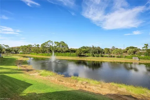 a view of a lake with a city