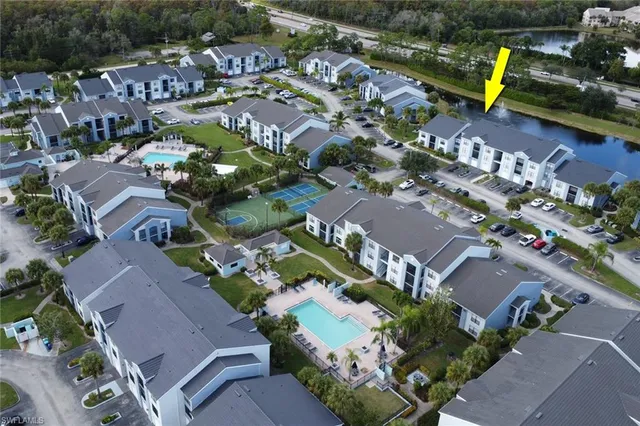 an aerial view of a houses with outdoor space