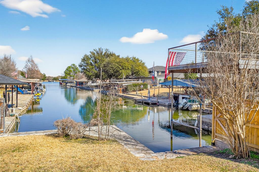 4309 Davis Road Granbury, TX 76049 - Photo 1 of 40 Backyard with cut in boat skip