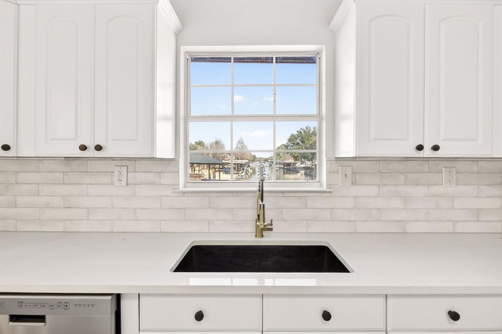 4309 Davis Road Granbury, TX 76049 - Photo 2 of 40 Overlook the water while doing the dishes in the kitchen