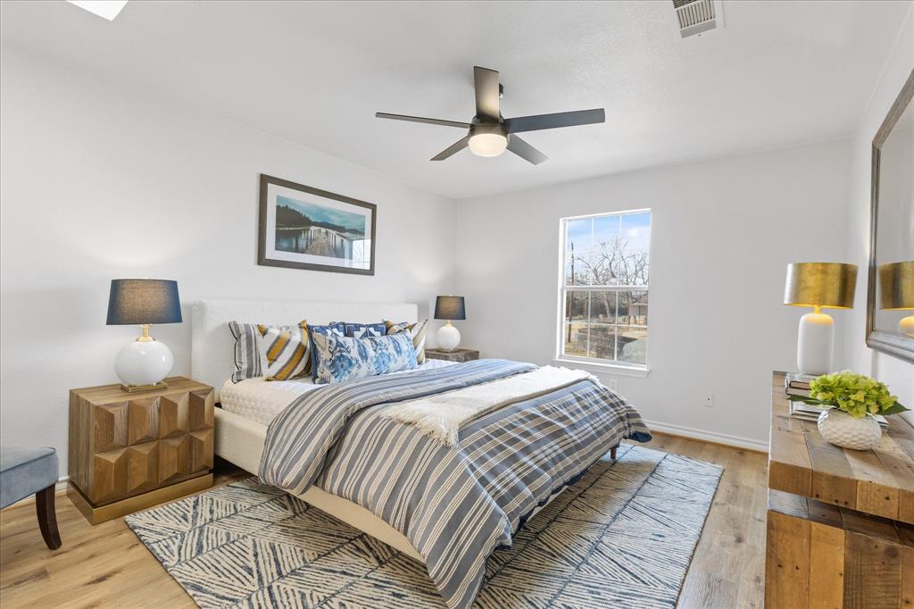 4309 Davis Road Granbury, TX 76049 - Photo 29 of 40 a bedroom with a bed and a window