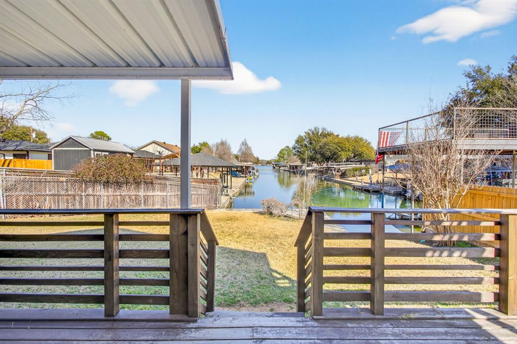 4309 Davis Road Granbury, TX 76049 - Photo 34 of 40 Back deck with stairs down to the water