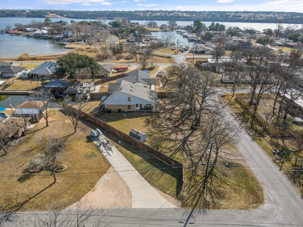 4309 Davis Road Granbury, TX 76049 - Photo 38 of 40 an aerial view of residential houses with outdoor space