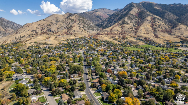 1143 East Mountain Road Logan, UT 84321 - Photo 58 of 64 Mountain backdrop with residential properties and extensive tree coverage