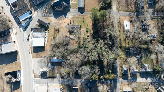 an aerial view of streets and trees