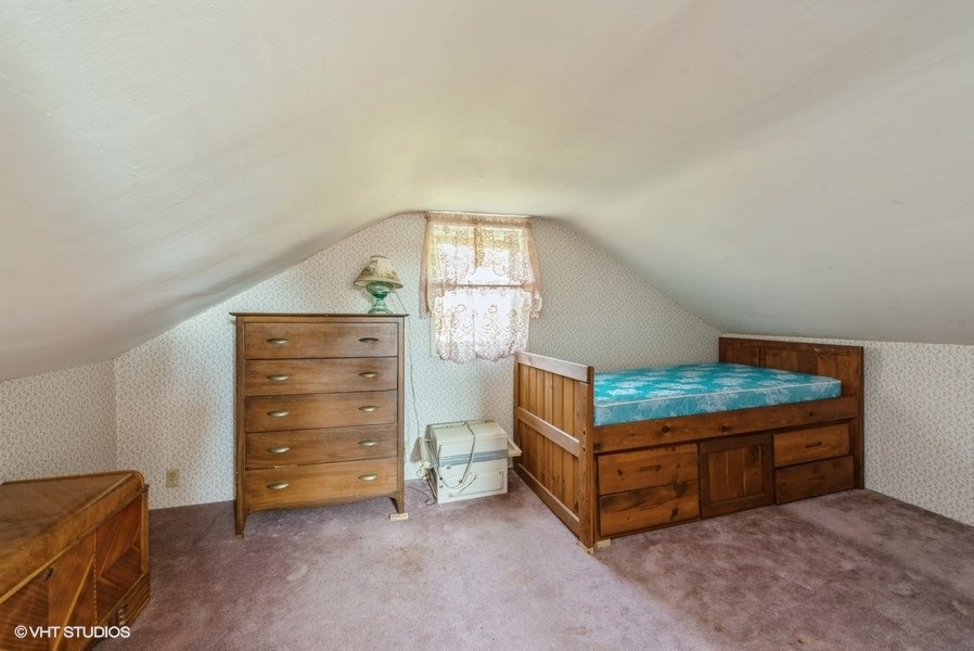 6002 Pine Street Harvard, IL 60033 - Photo 14 of 21 a bedroom with a bunk bed and a dresser in it