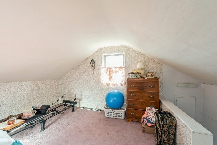 6002 Pine Street Harvard, IL 60033 - Photo 16 of 21 a bedroom with a bed and a window