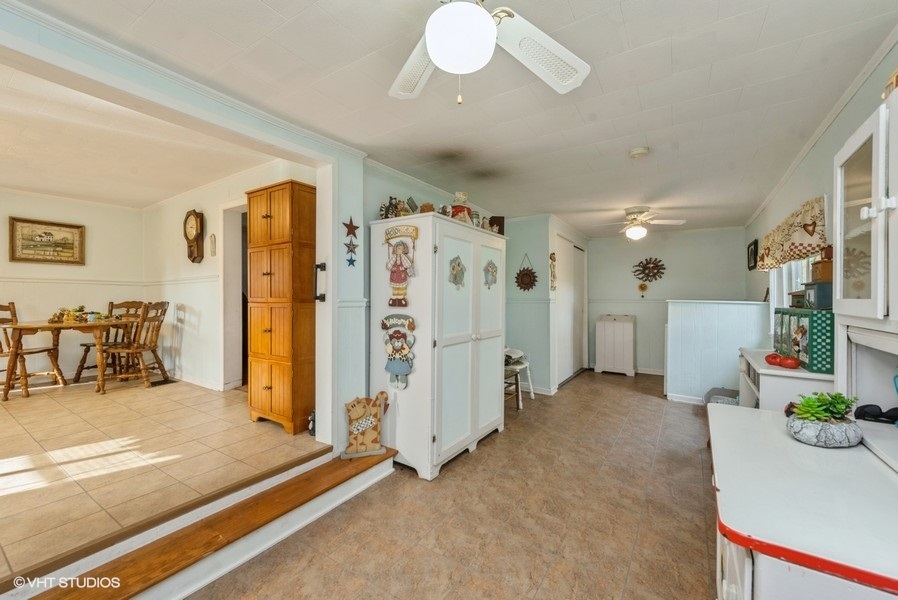 6002 Pine Street Harvard, IL 60033 - Photo 9 of 21 a view of a livingroom with a furniture and toys