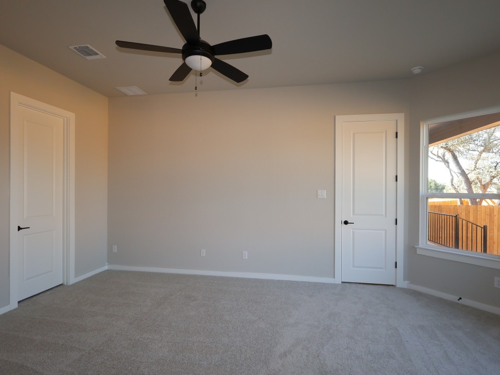 374 Bishop Wood Road Dripping Springs, TX 78620 - Photo 6 of 18 a view of a room with a window