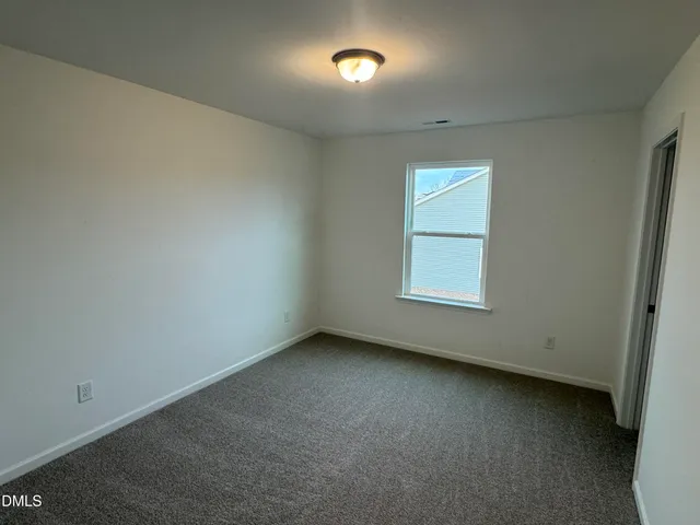 a view of empty room with window