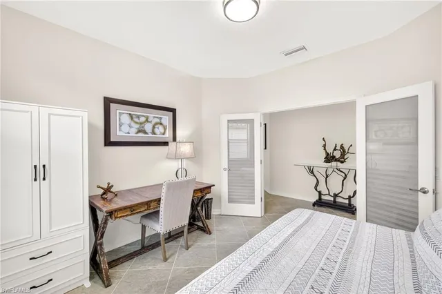 a workspace with wooden floor and a rug