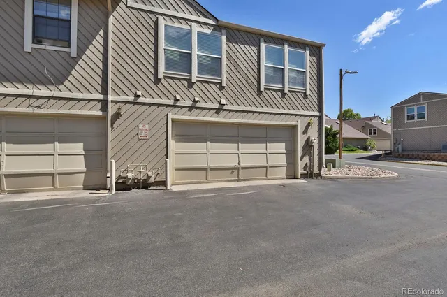 a view of a golf course with a lake view