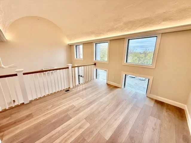 a view of a house with wooden floor
