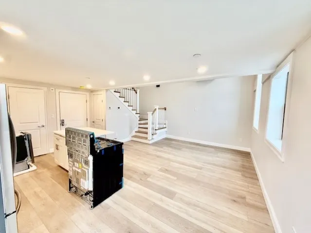 a view of kitchen island with cabinets