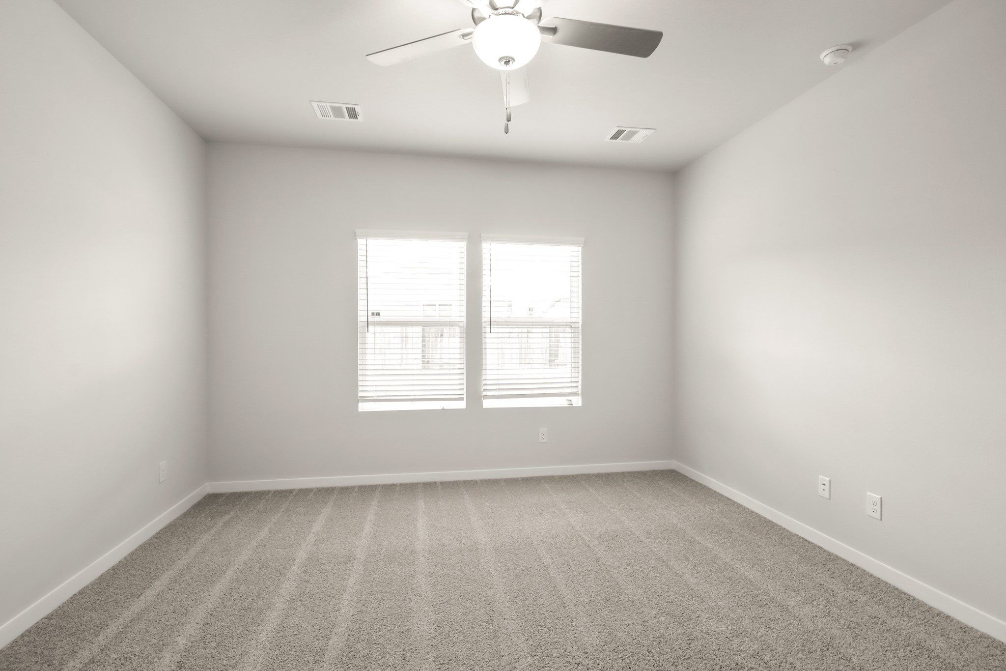 9790 Caney Bend Road Conroe, TX 77303 - Photo 11 of 22 an empty room with a window