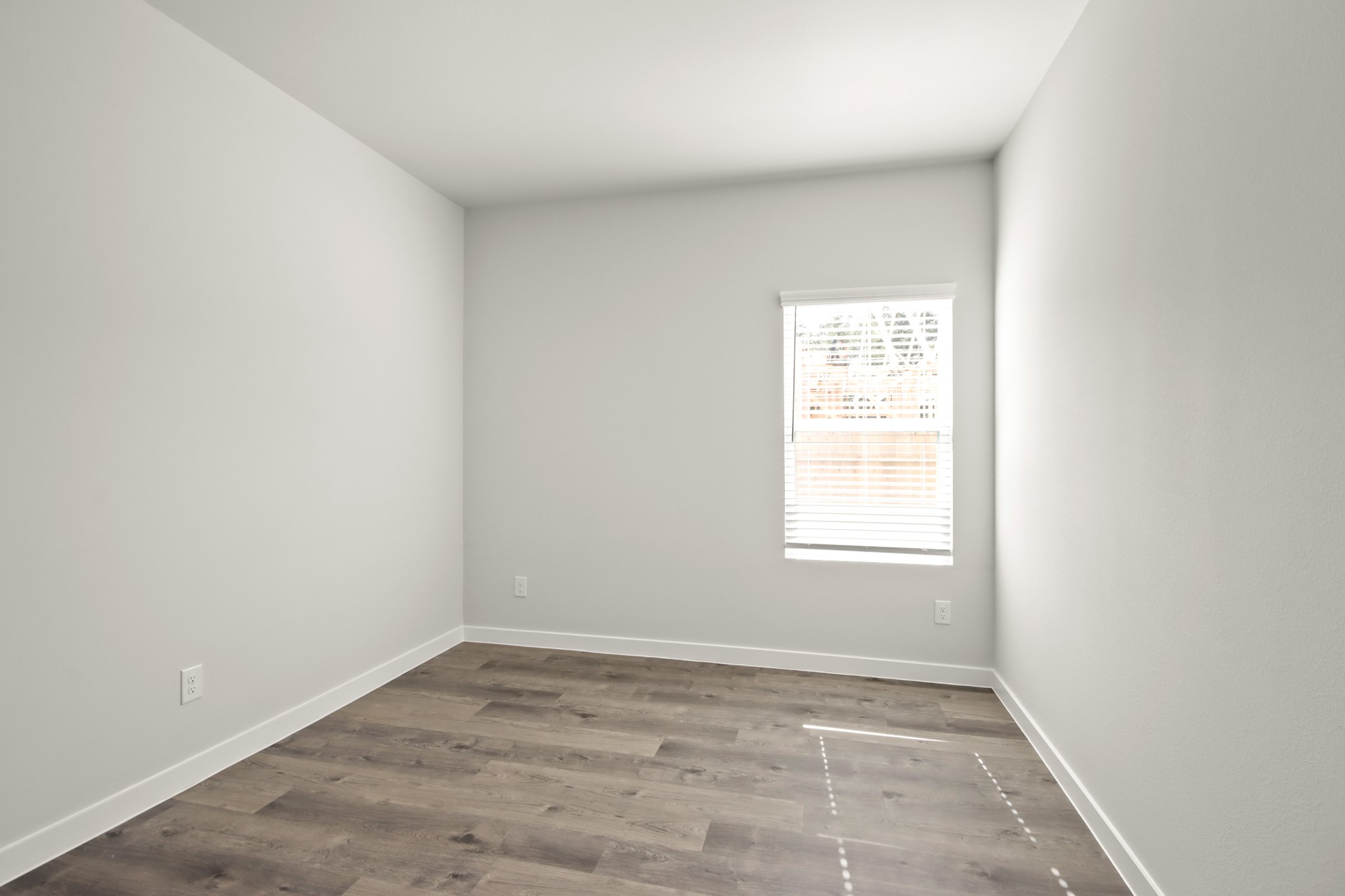9790 Caney Bend Road Conroe, TX 77303 - Photo 16 of 22 an empty room with a window