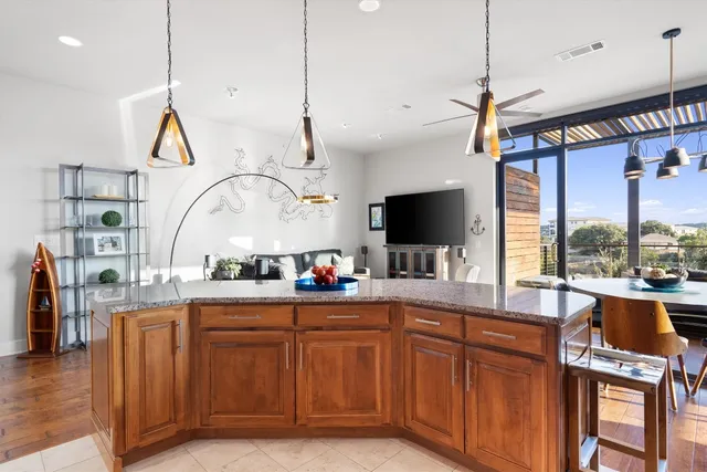 a kitchen with sink cabinets and window