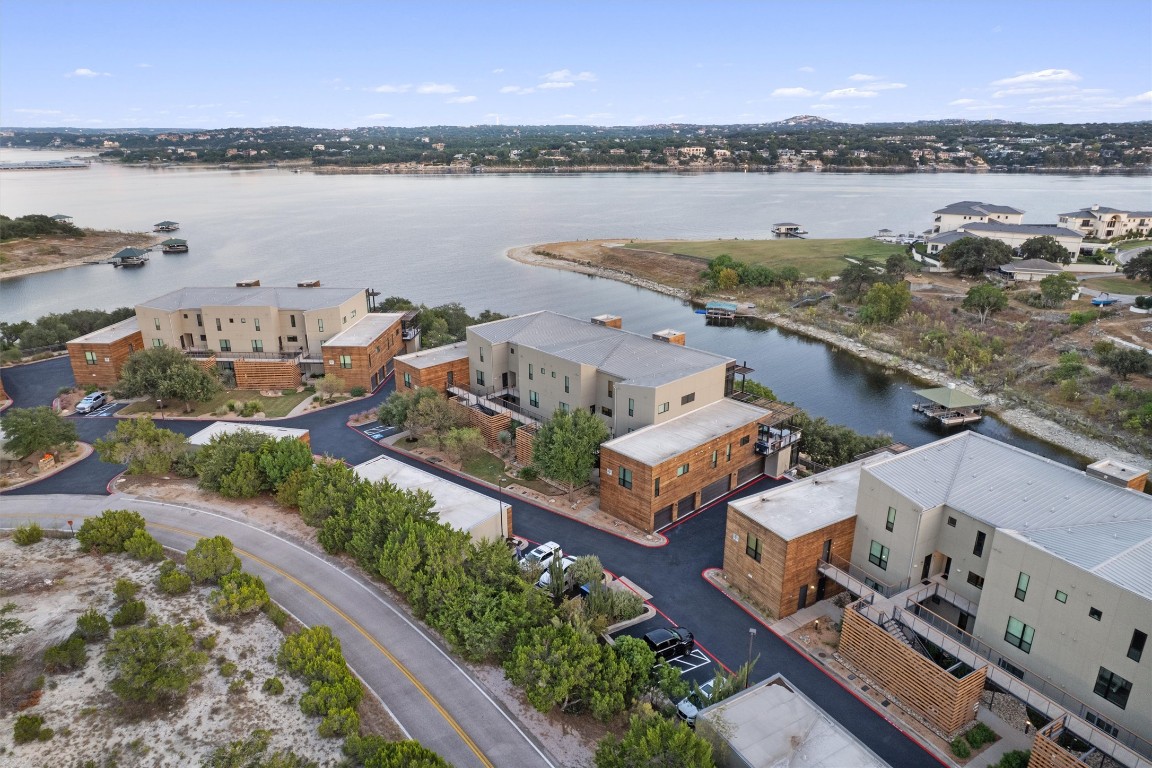 1101 Ivean Pearson Road, Unit E208 Lago Vista, TX 78645 - Photo 2 of 40 a view of a city with lake