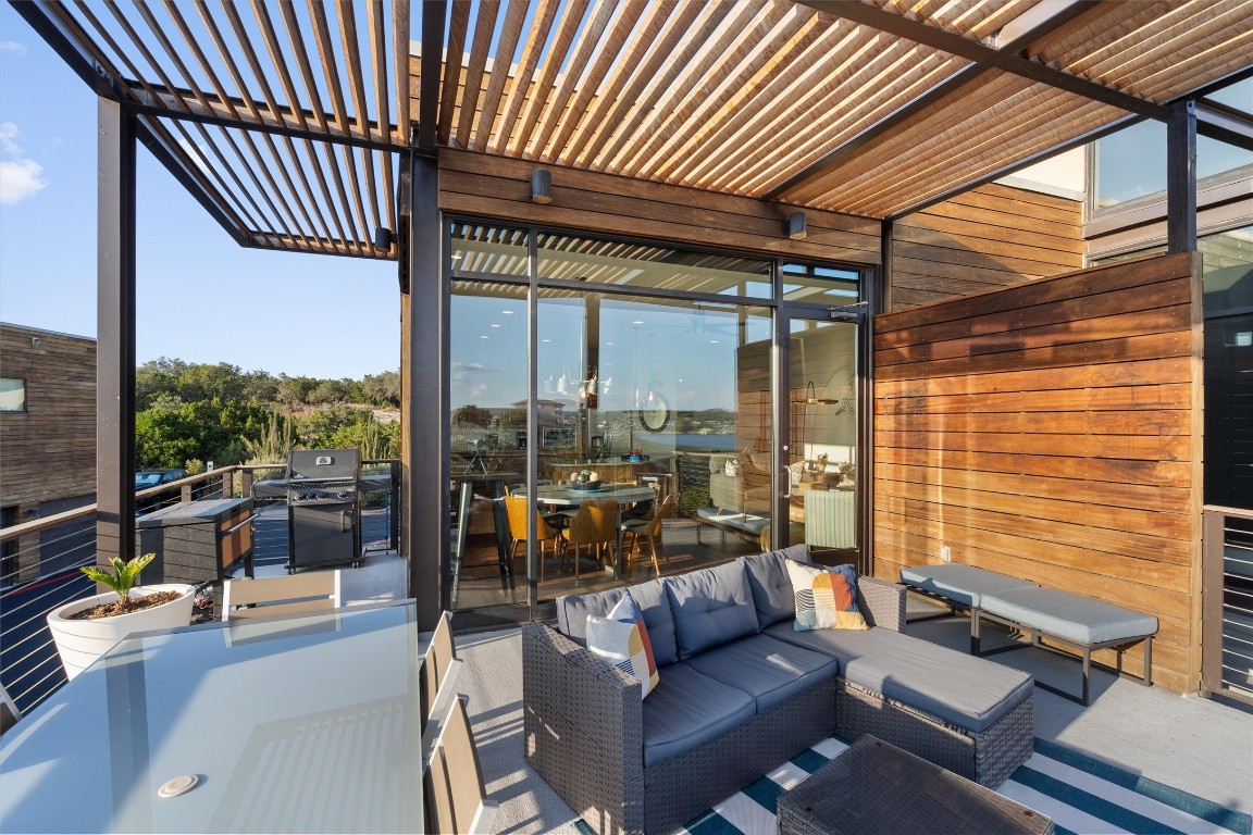 1101 Ivean Pearson Road, Unit E208 Lago Vista, TX 78645 - Photo 30 of 40 a outdoor living space with patio furniture