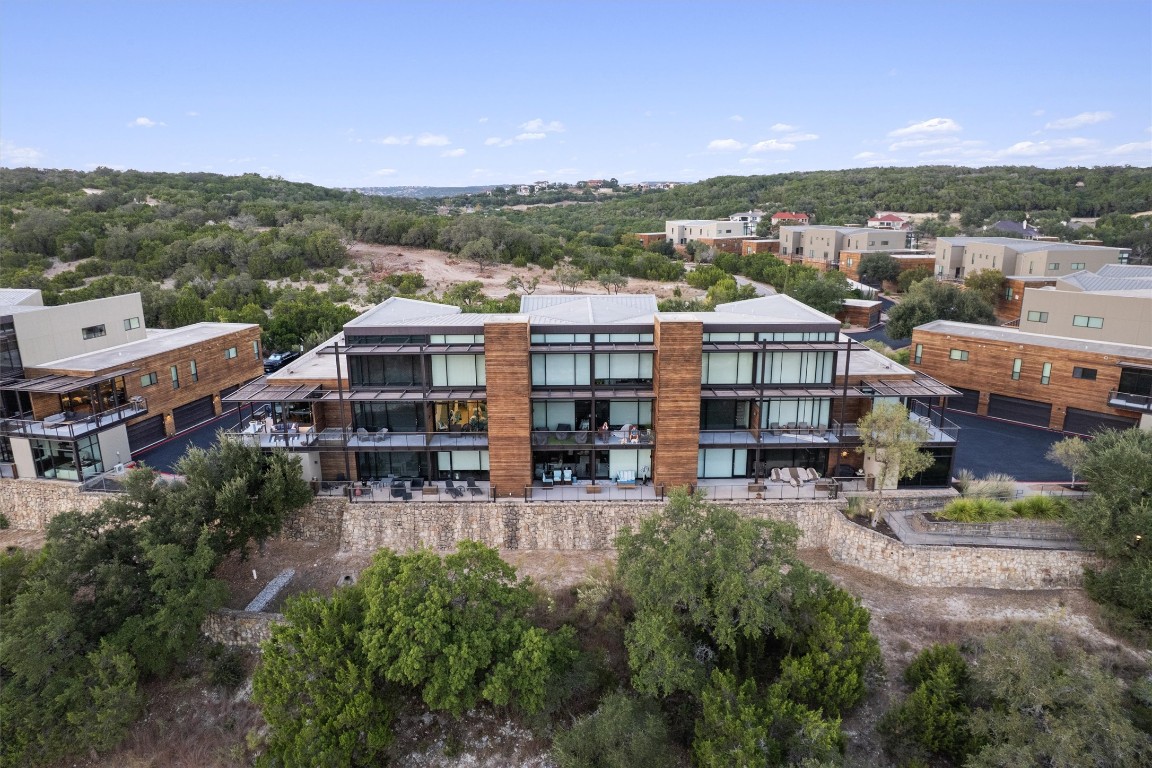 1101 Ivean Pearson Road, Unit E208 Lago Vista, TX 78645 - Photo 38 of 40 an aerial view of a house with a big yard