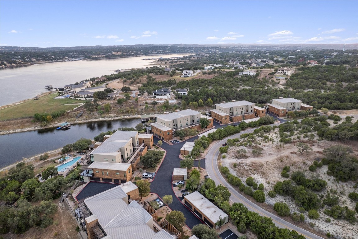 1101 Ivean Pearson Road, Unit E208 Lago Vista, TX 78645 - Photo 39 of 40 an aerial view of a city with ocean view