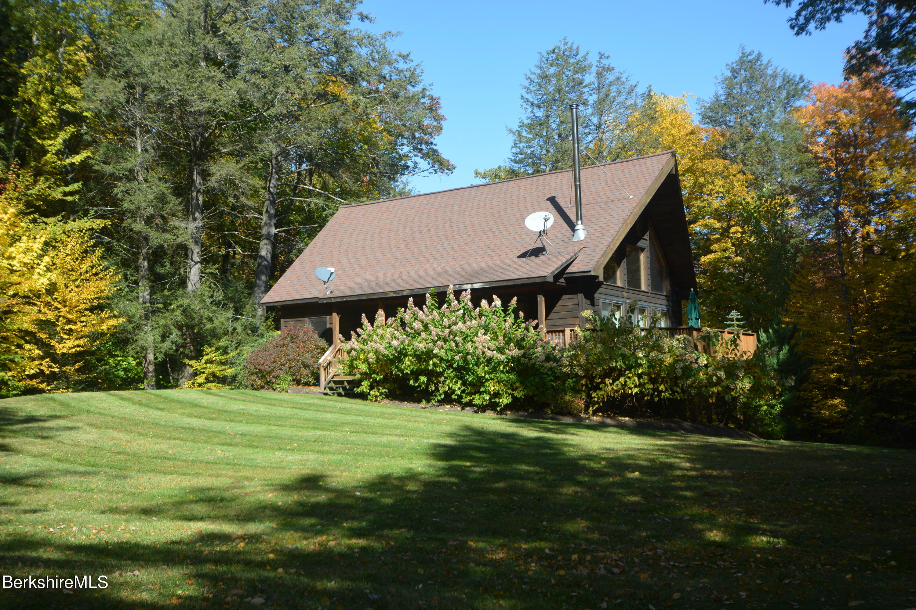 462 Bonny Rigg Hill Road Becket, MA 01223 - Photo 1 of 28 a view of a house with a yard