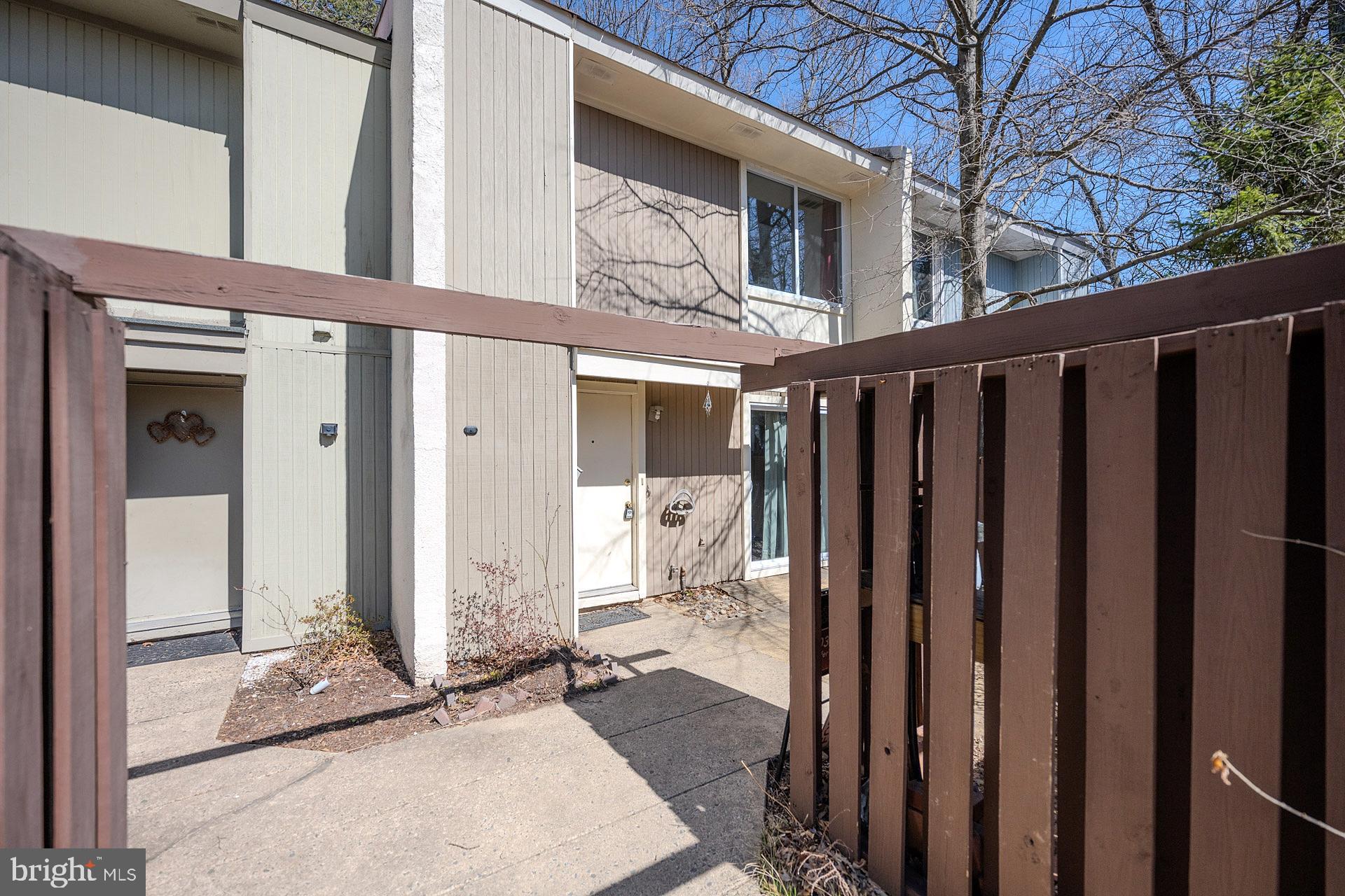 2202 Southgate Square Reston, VA 20191 - Photo 3 of 26 a front view of a house with a outdoor space
