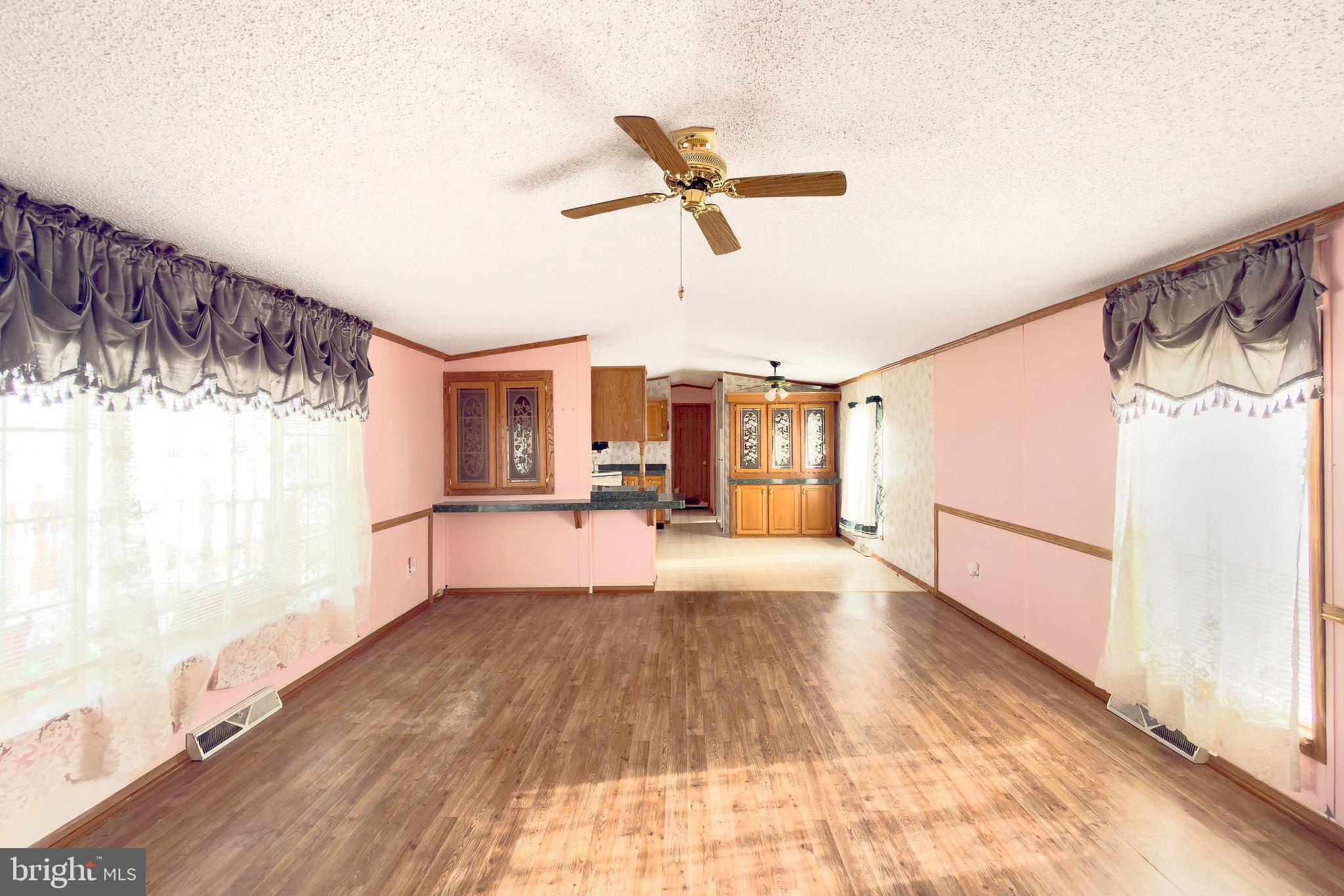 22 St Michaels Court Elkton, MD 21921 - Photo 4 of 16 Living room looking into kitchen