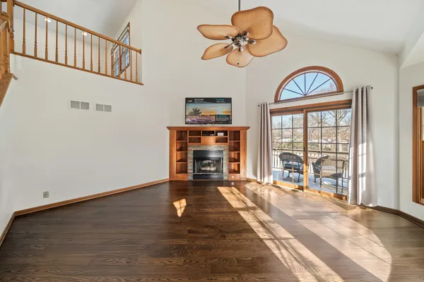 a kitchen with stainless steel appliances granite countertop a stove and cabinets