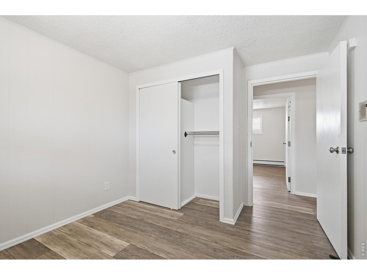11590 West 39th Place Wheat Ridge, CO 80033 - Photo 17 of 37 a view of an empty room