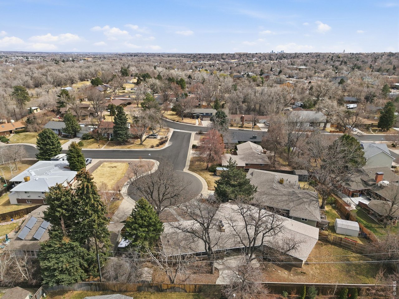 11590 West 39th Place Wheat Ridge, CO 80033 - Photo 28 of 37 an aerial view of a house with a yard