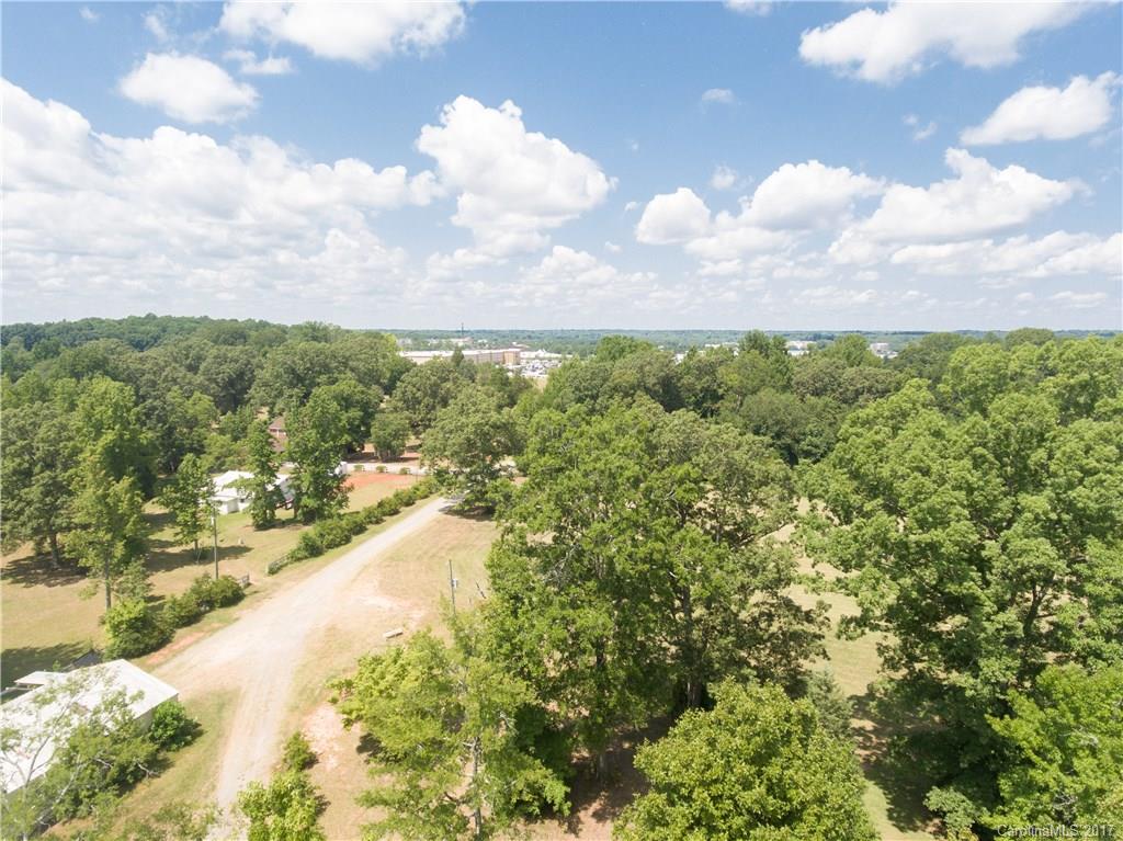 1088 Red River Road Rock Hill, SC 29730 - Photo 8 of 24 a view of a lake with a building in the background