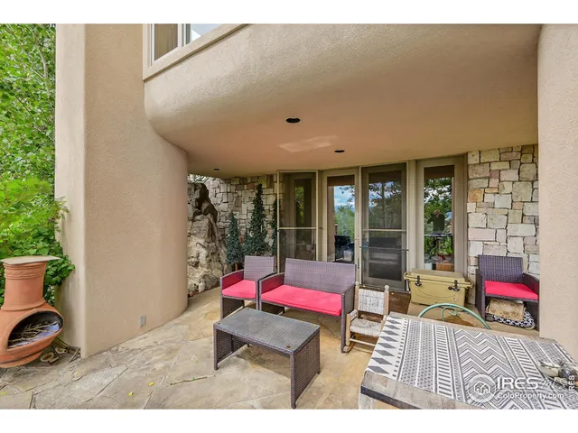 a house with outdoor seating space