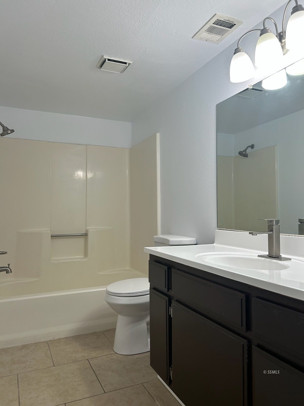 824 C Capehart Court Ridgecrest, CA 93555 - Photo 7 of 11 a bathroom with a sink a toilet and shower
