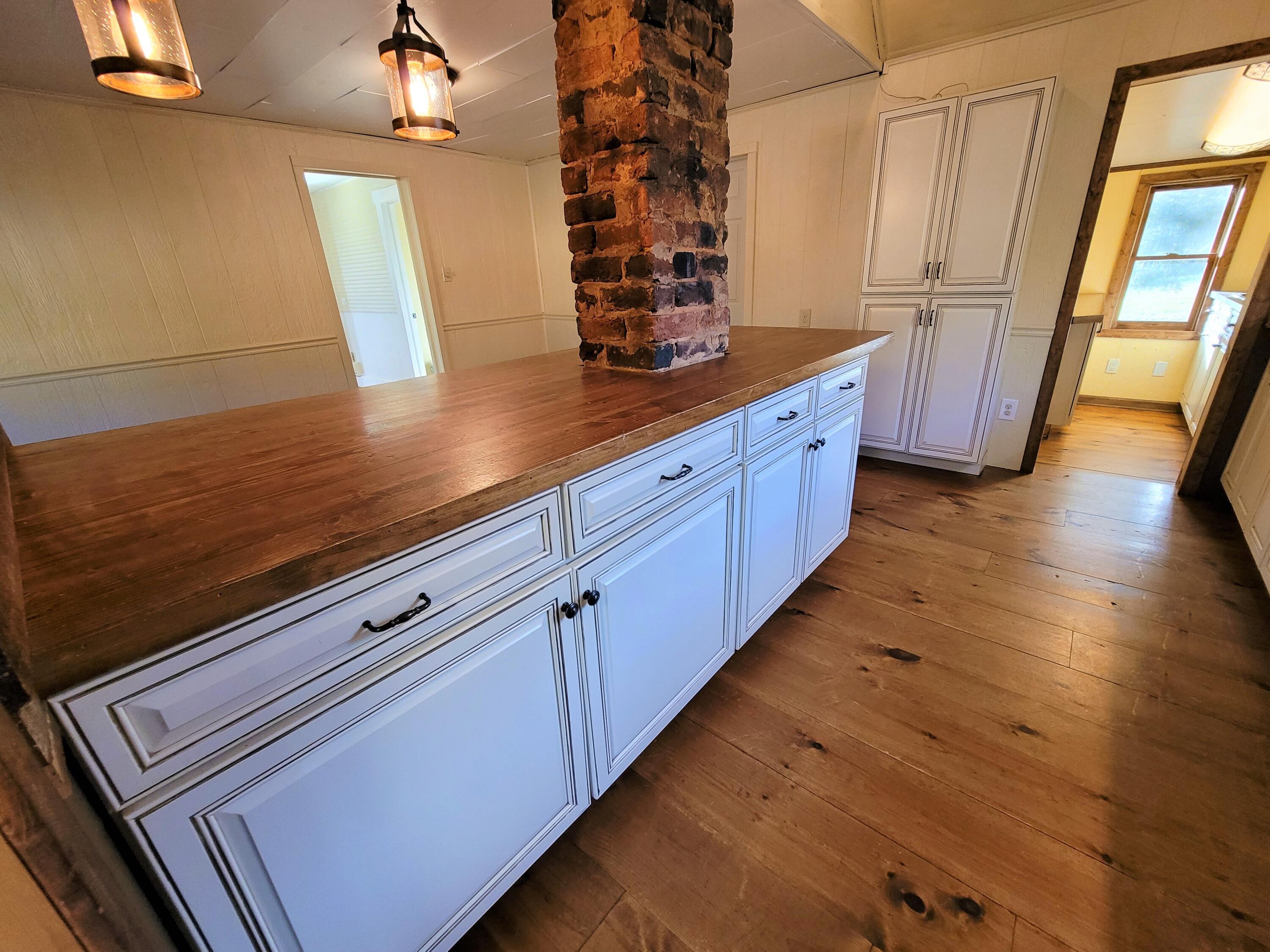 330 Green Level Road Boones Mill, VA 24065 - Photo 12 of 43 a kitchen with sink and cabinets