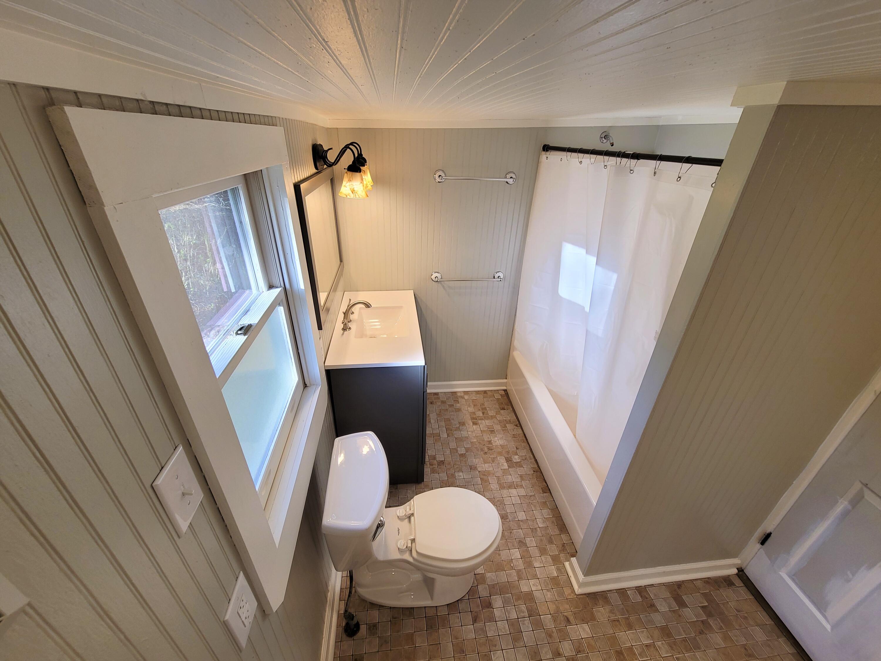 330 Green Level Road Boones Mill, VA 24065 - Photo 21 of 43 a bathroom with a sink and a mirror