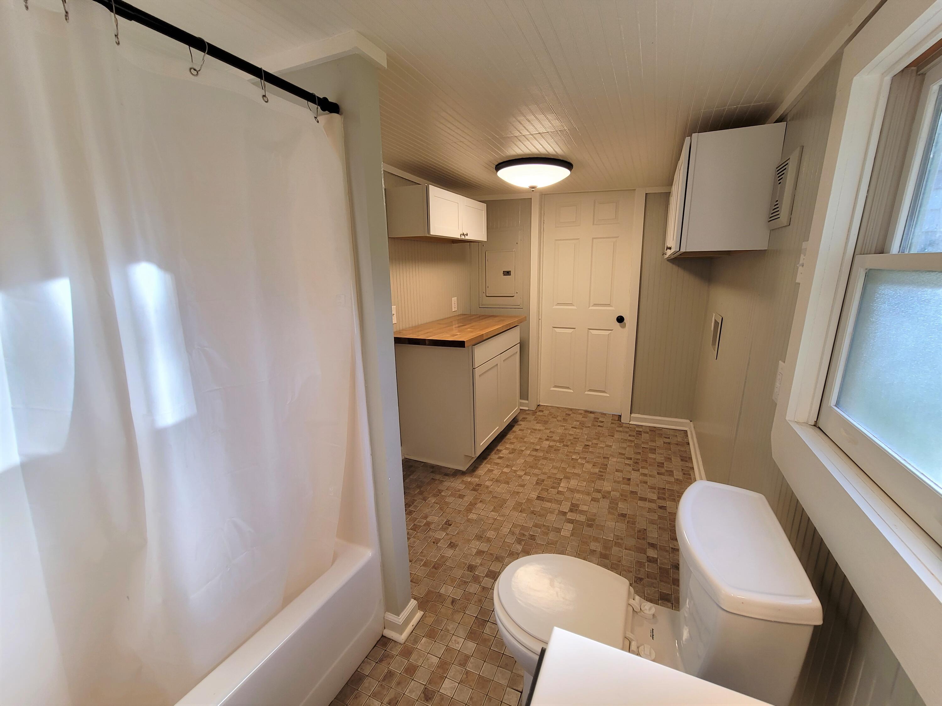 330 Green Level Road Boones Mill, VA 24065 - Photo 23 of 43 a bathroom with a sink toilet and shower