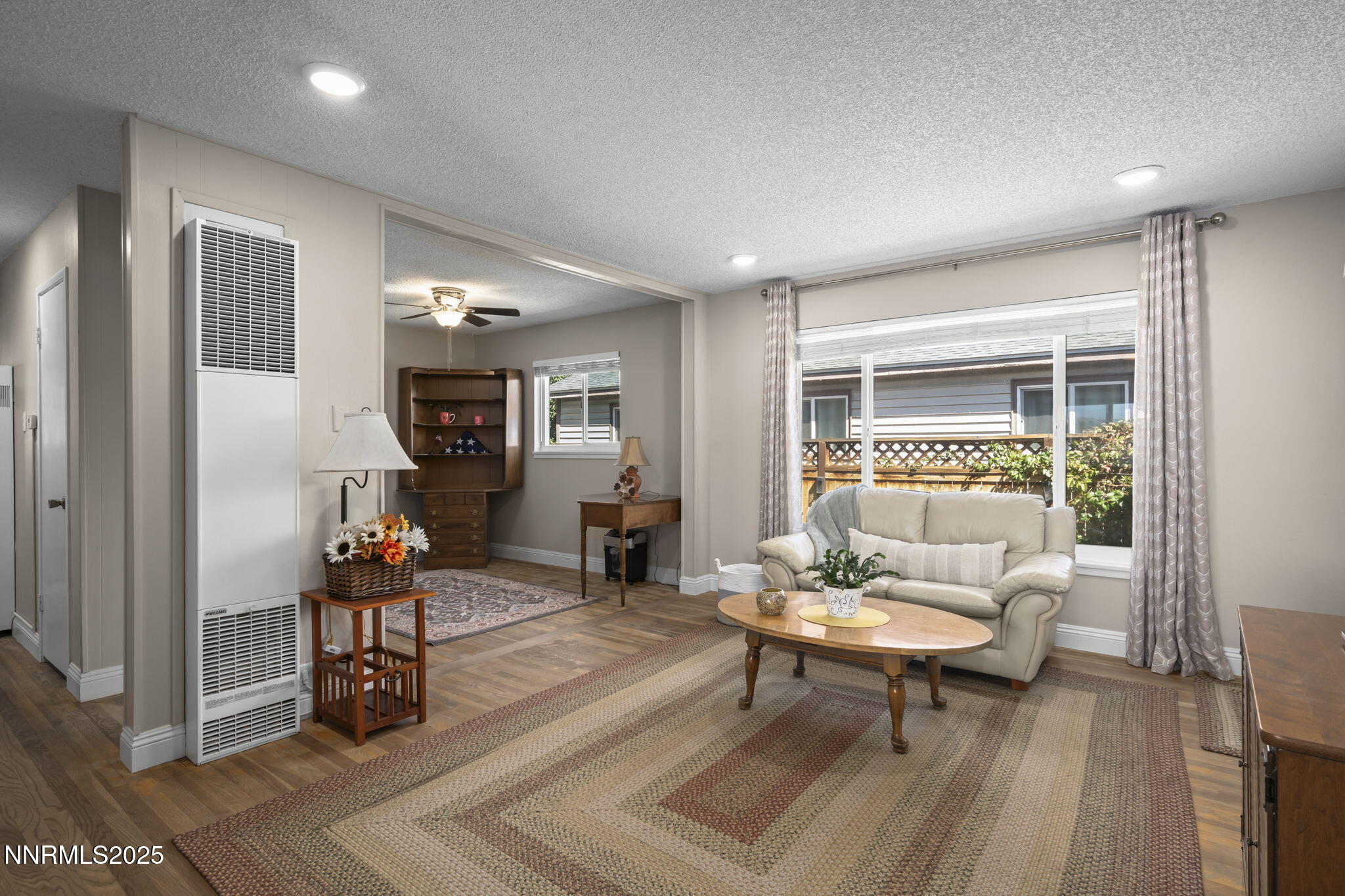 1680 Sutro Street Reno, NV 89512 - Photo 11 of 25 a living room with furniture and a wooden floor