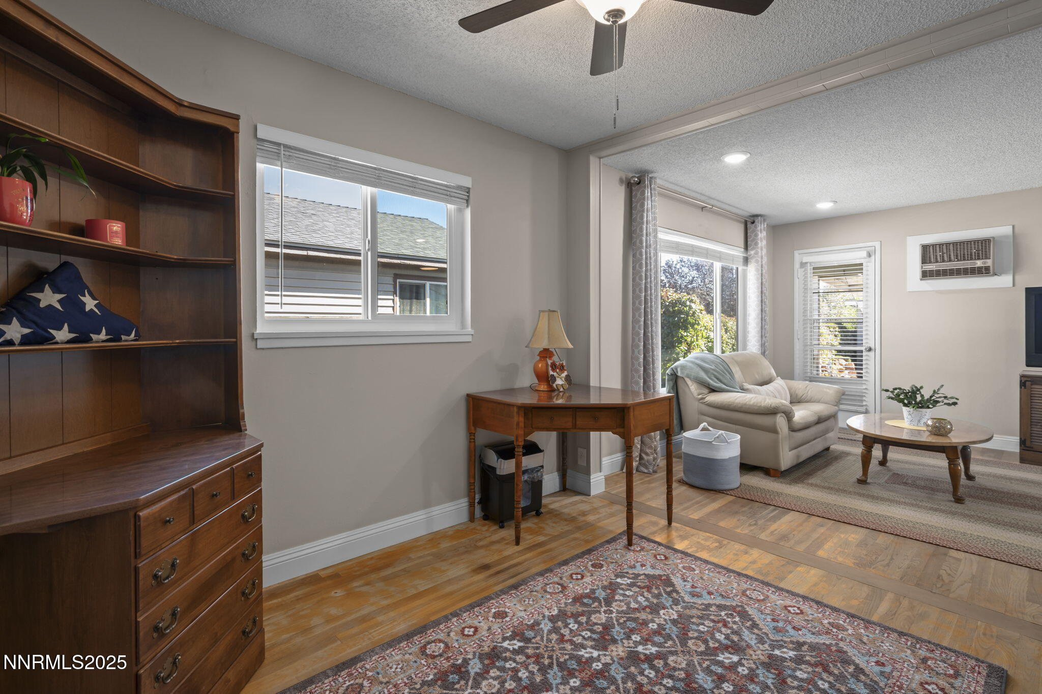 1680 Sutro Street Reno, NV 89512 - Photo 15 of 25 a living room with furniture a rug and a window