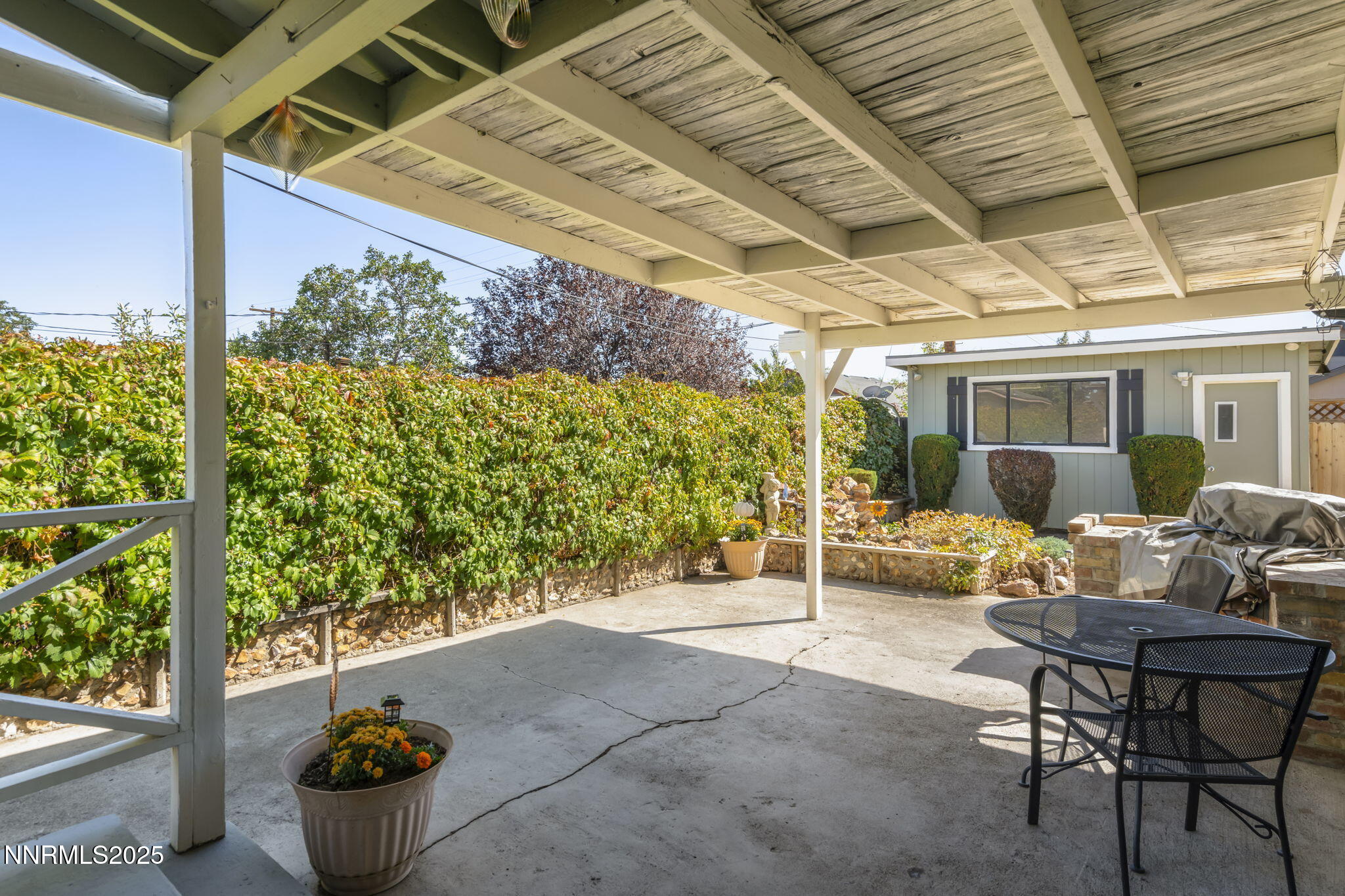 1680 Sutro Street Reno, NV 89512 - Photo 19 of 25 a view of a patio with couches and potted plants
