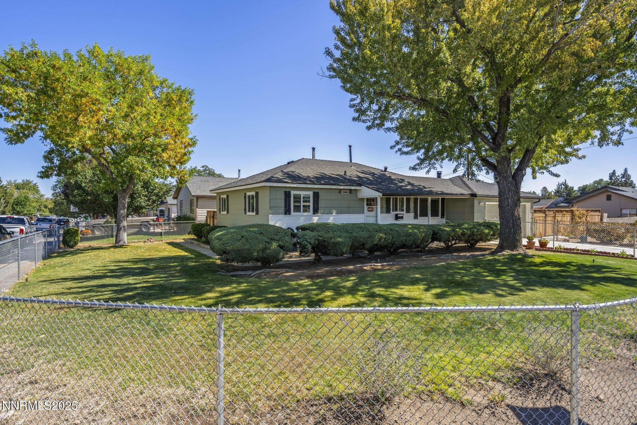 1680 Sutro Street Reno, NV 89512 - Photo 2 of 25 a view of a house with swimming pool and a yard