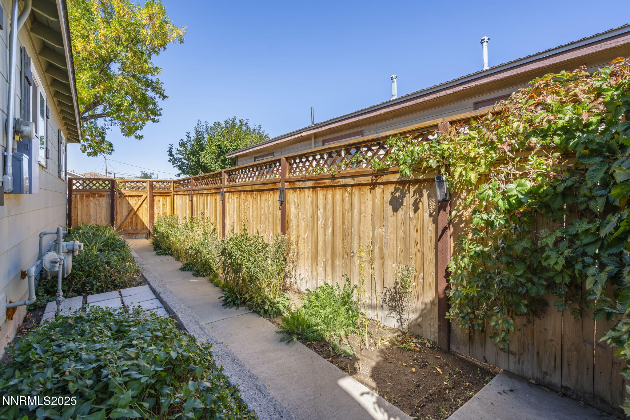 1680 Sutro Street Reno, NV 89512 - Photo 21 of 25 a view of a building with a garden