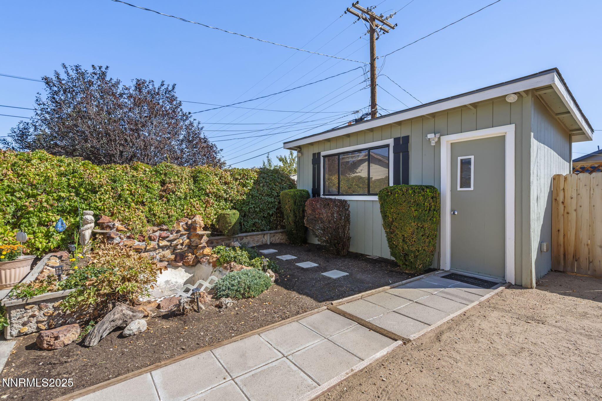 1680 Sutro Street Reno, NV 89512 - Photo 24 of 25 a front view of a house with garden