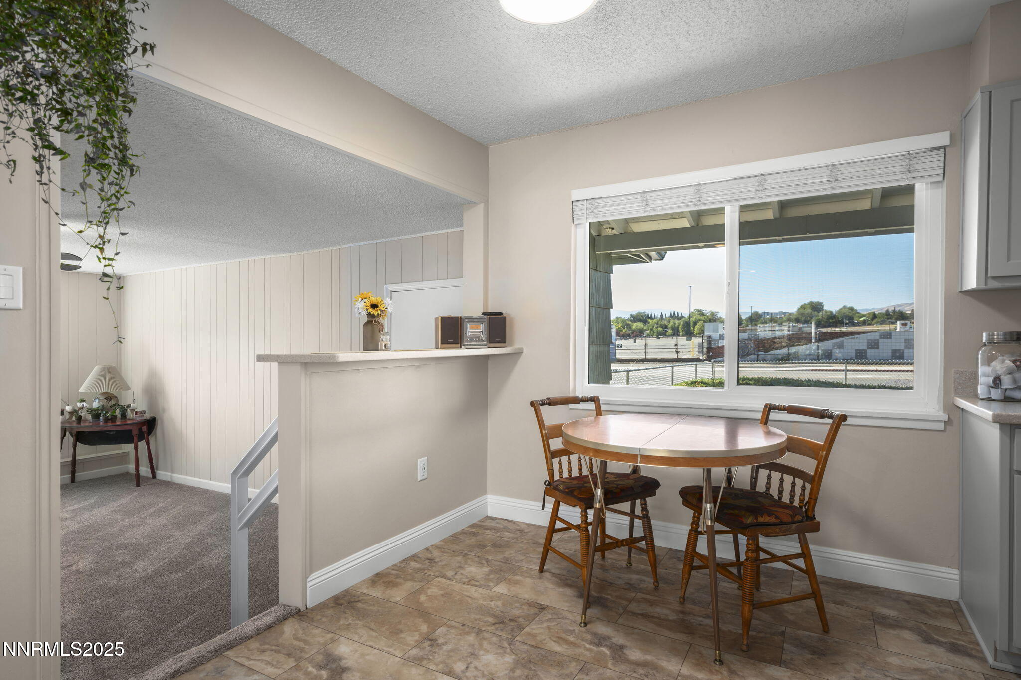 1680 Sutro Street Reno, NV 89512 - Photo 7 of 25 a dining room with furniture and window