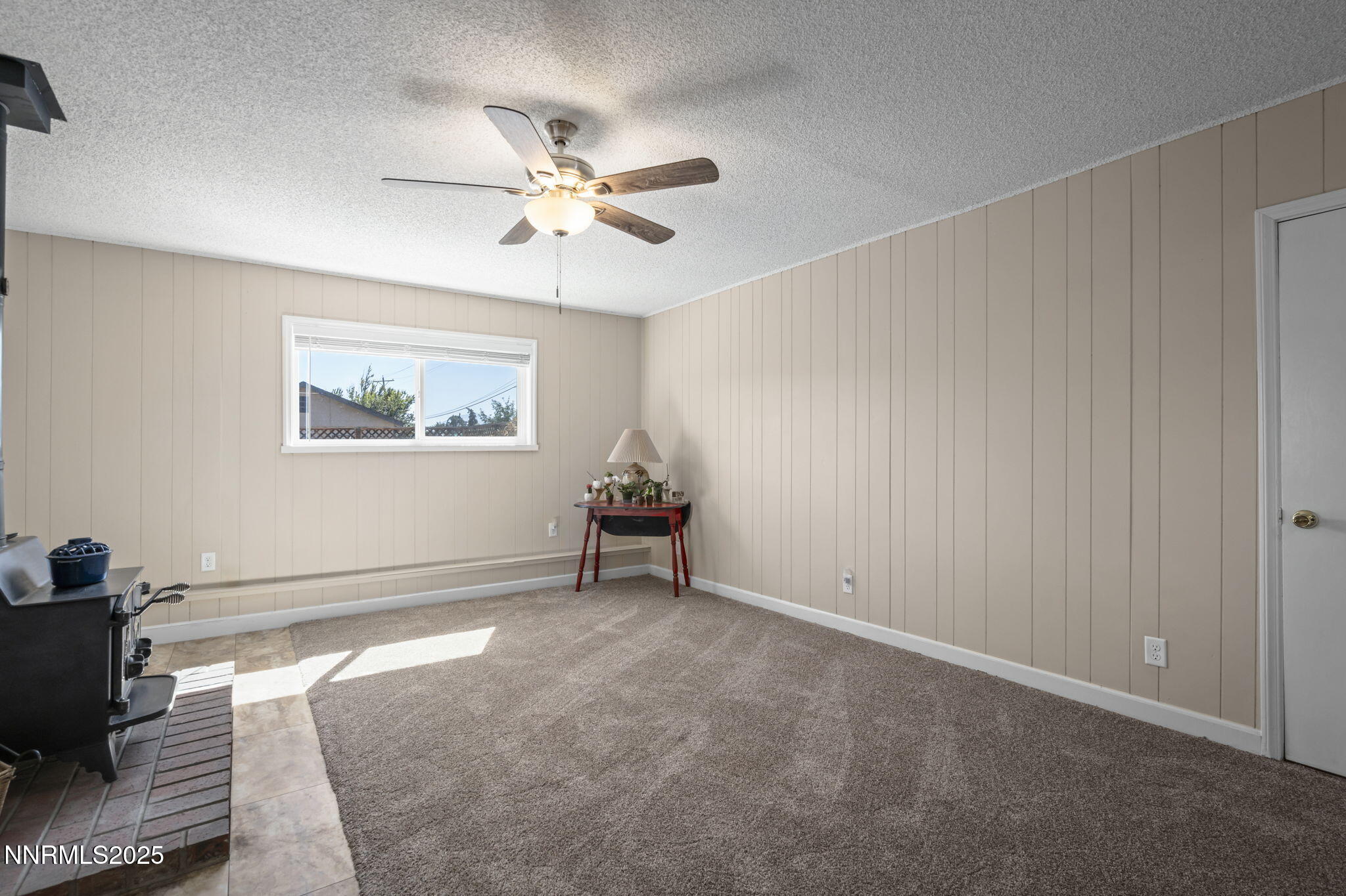 1680 Sutro Street Reno, NV 89512 - Photo 8 of 25 a view of an empty room with a window