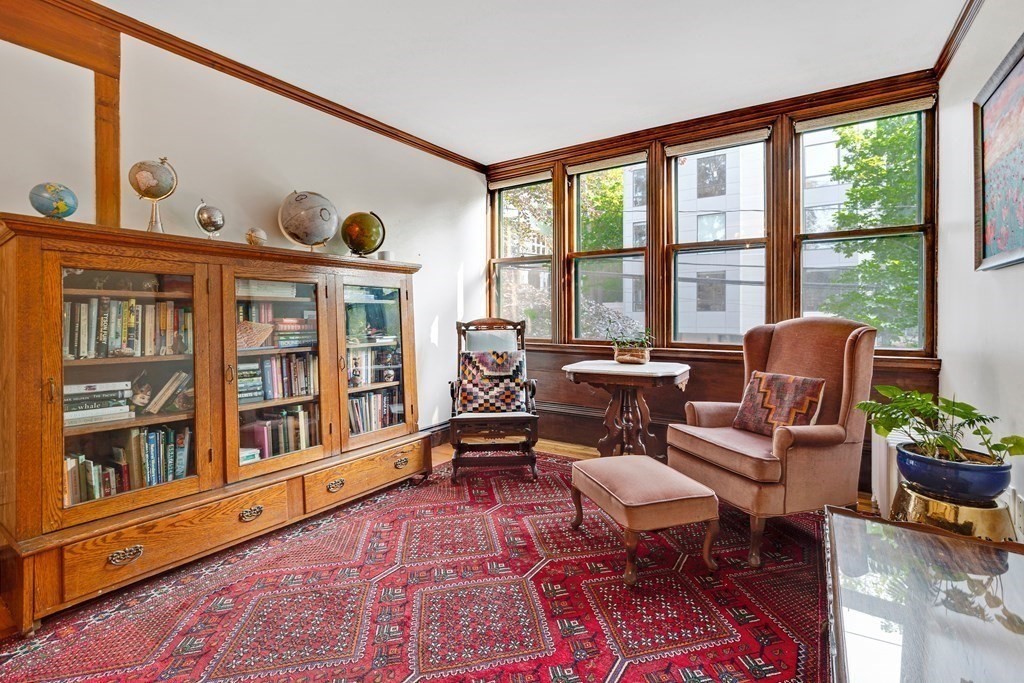 157 Winthrop Road, Unit 1 Brookline, MA 02445 - Photo 29 of 36 a living room with furniture and a window