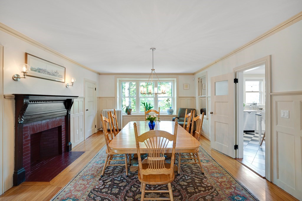 157 Winthrop Road, Unit 1 Brookline, MA 02445 - Photo 3 of 36 a view of a dining room with furniture window and wooden floor